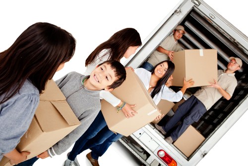 Removal team planning a move in Millwall apartment building