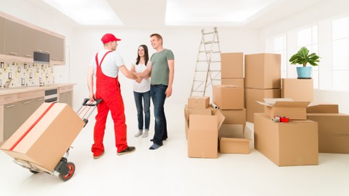 House moving service for a Millwall family home with furniture and packing boxes