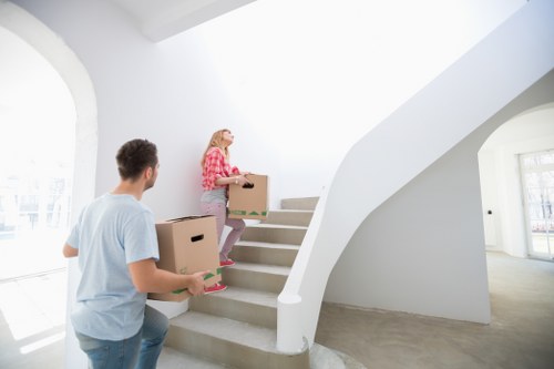 Furniture and boxes being unloaded for a home or business move in Millwall