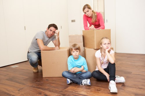 Packed boxes and furniture loaded into a removals van for an East London move