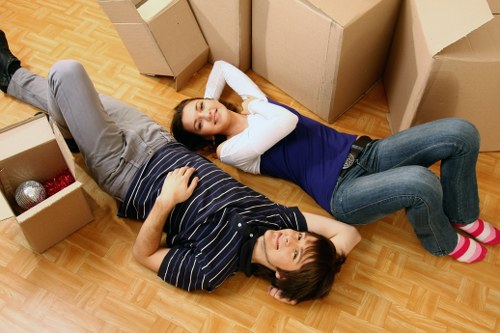 Local removals team handling apartment access in Millwall